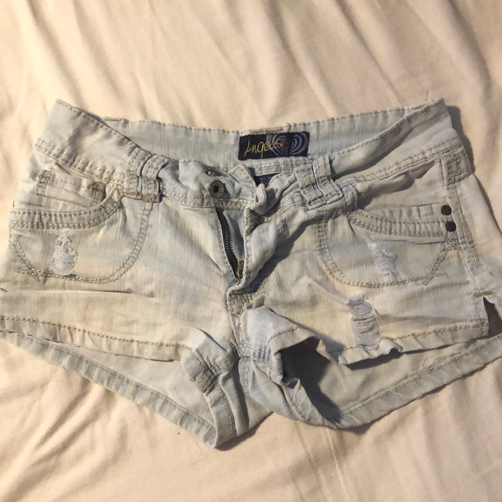 Distressed light wash Jean shorts